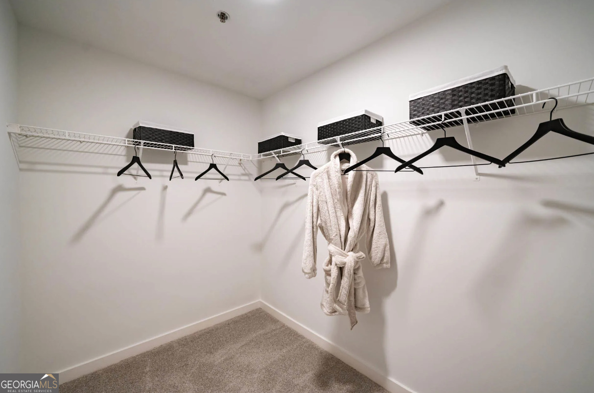 3242 Peachtree Road Northeast, Unit 1408 Atlanta, GA 30305 - Photo 23 of 41 a view of a room with gym equipment