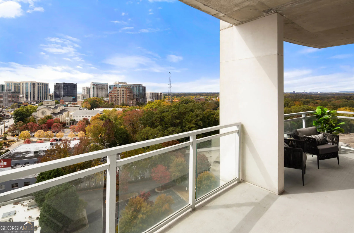 3242 Peachtree Road Northeast, Unit 1408 Atlanta, GA 30305 - Photo 26 of 41 a view of a balcony with city view