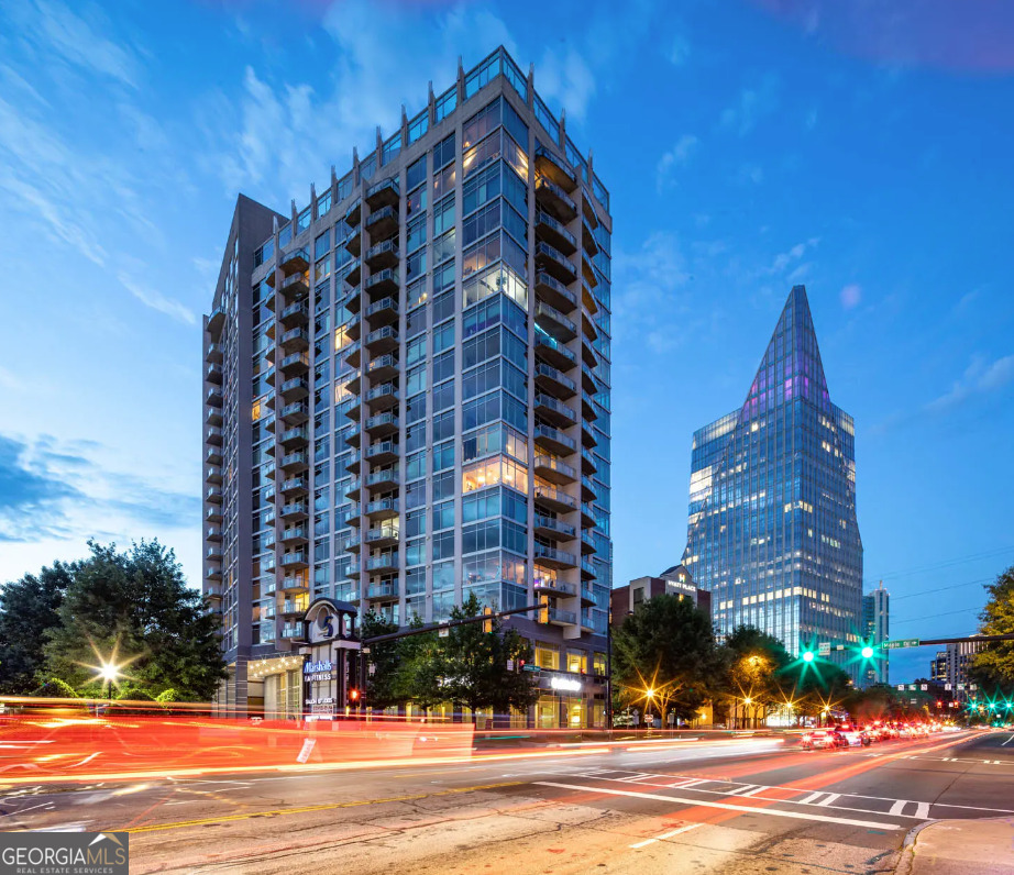3242 Peachtree Road Northeast, Unit 1408 Atlanta, GA 30305 - Photo 31 of 41 a view of a building and a street