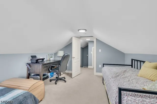 a bathroom with a sink a mirror and a window