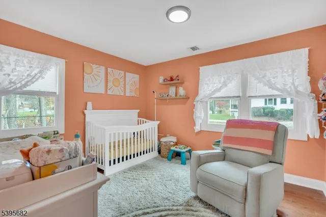 a view of a park with large trees