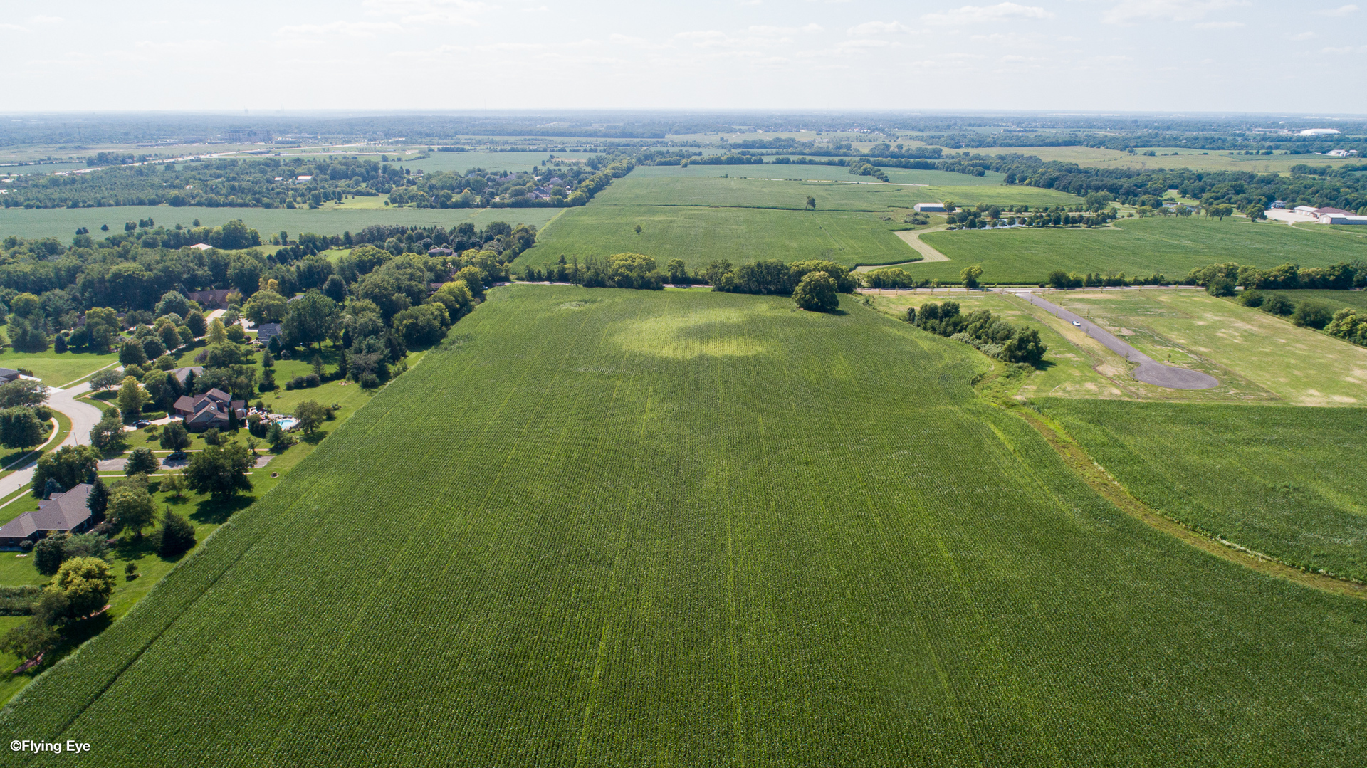 0 South Meader Road Mokena, IL 60448 - Photo 2 of 5 an aerial view of green landscape with trees