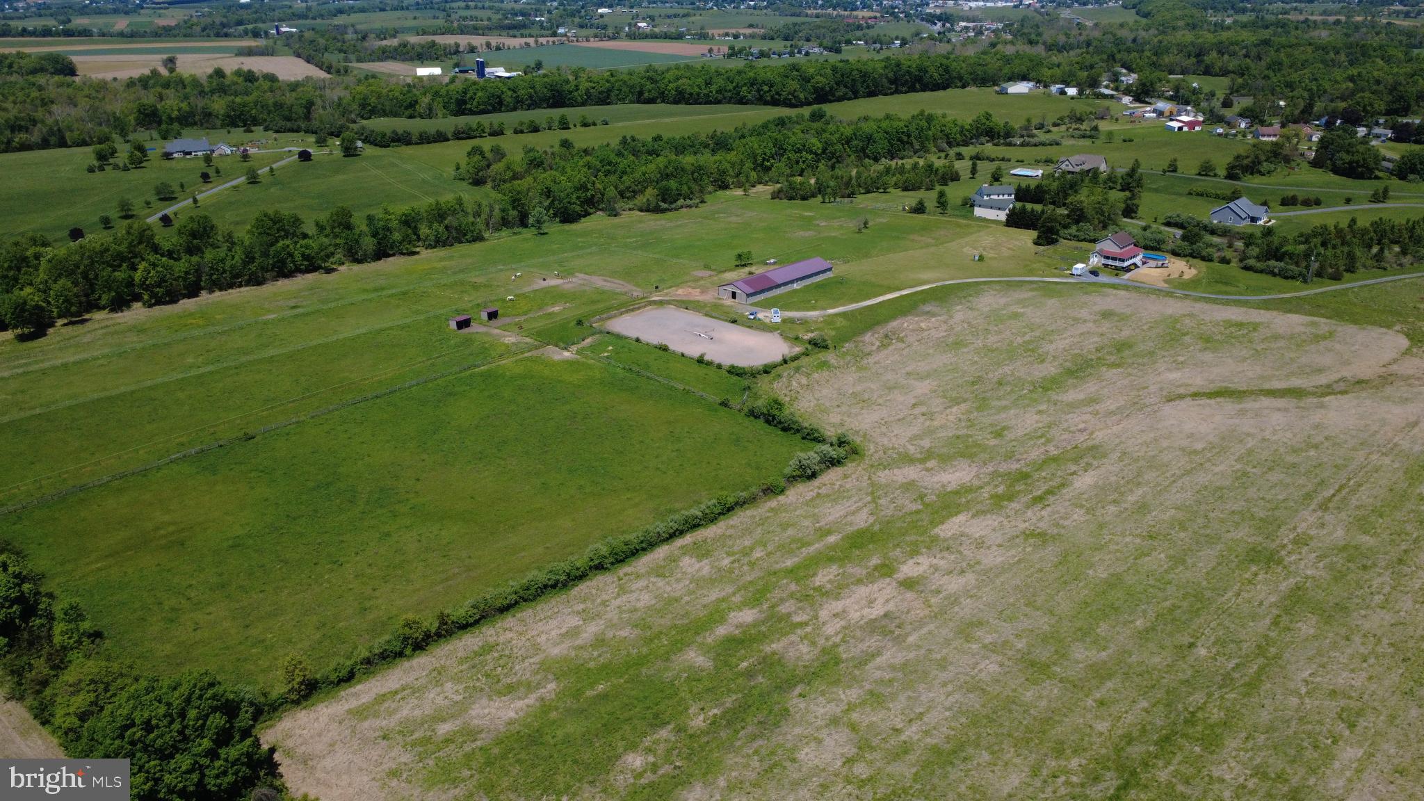 2472 Biglerville Road Gettysburg, PA 17325 - Photo 2 of 16 an aerial view of a golf course with parking space