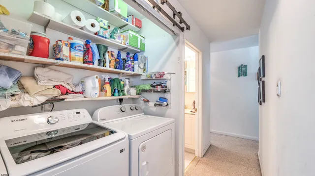 a storage room with washer and dryer
