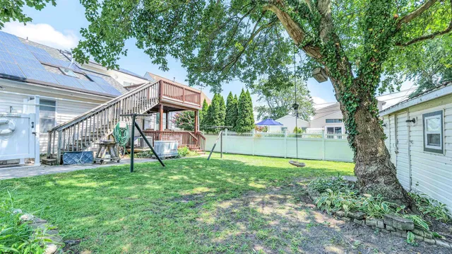 a view of stairs and patio with wooden floor