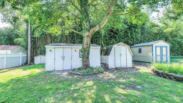 a view of a back yard of the house