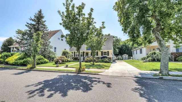 a view of street with houses