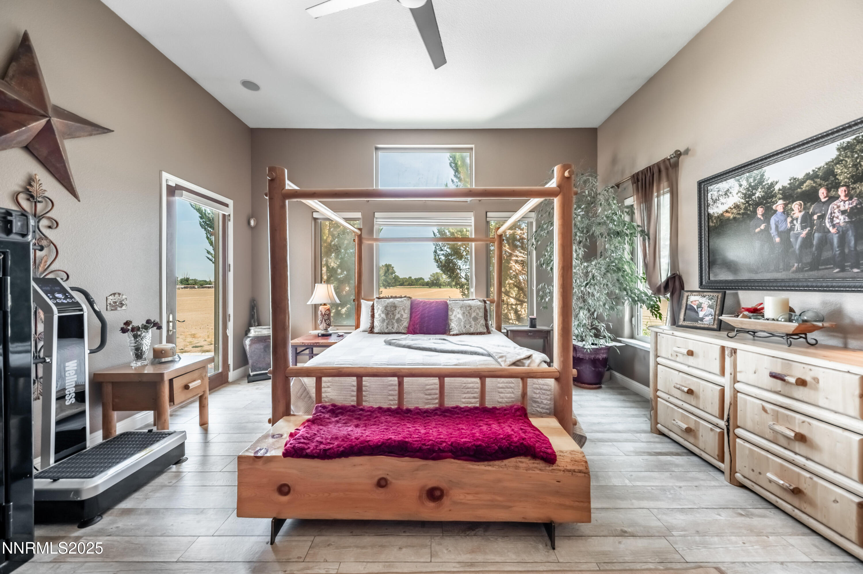 4433 Casey Road Fallon, NV 89406 - Photo 27 of 71 a bedroom with a bed a large window and flat screen tv