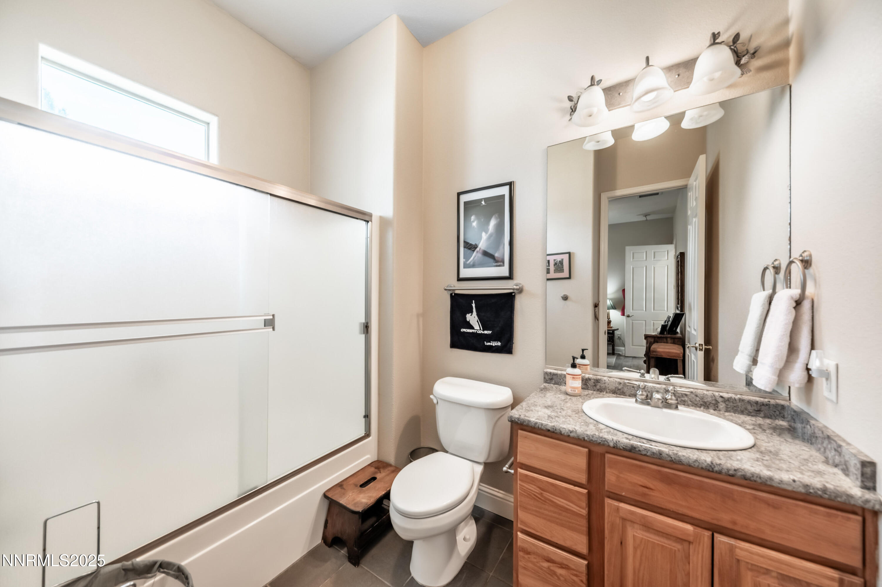4433 Casey Road Fallon, NV 89406 - Photo 38 of 71 a bathroom with a granite countertop sink toilet and shower