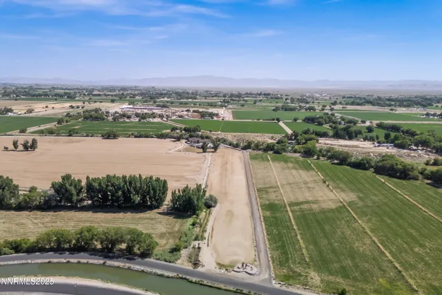 a front view of a house with garden and porch