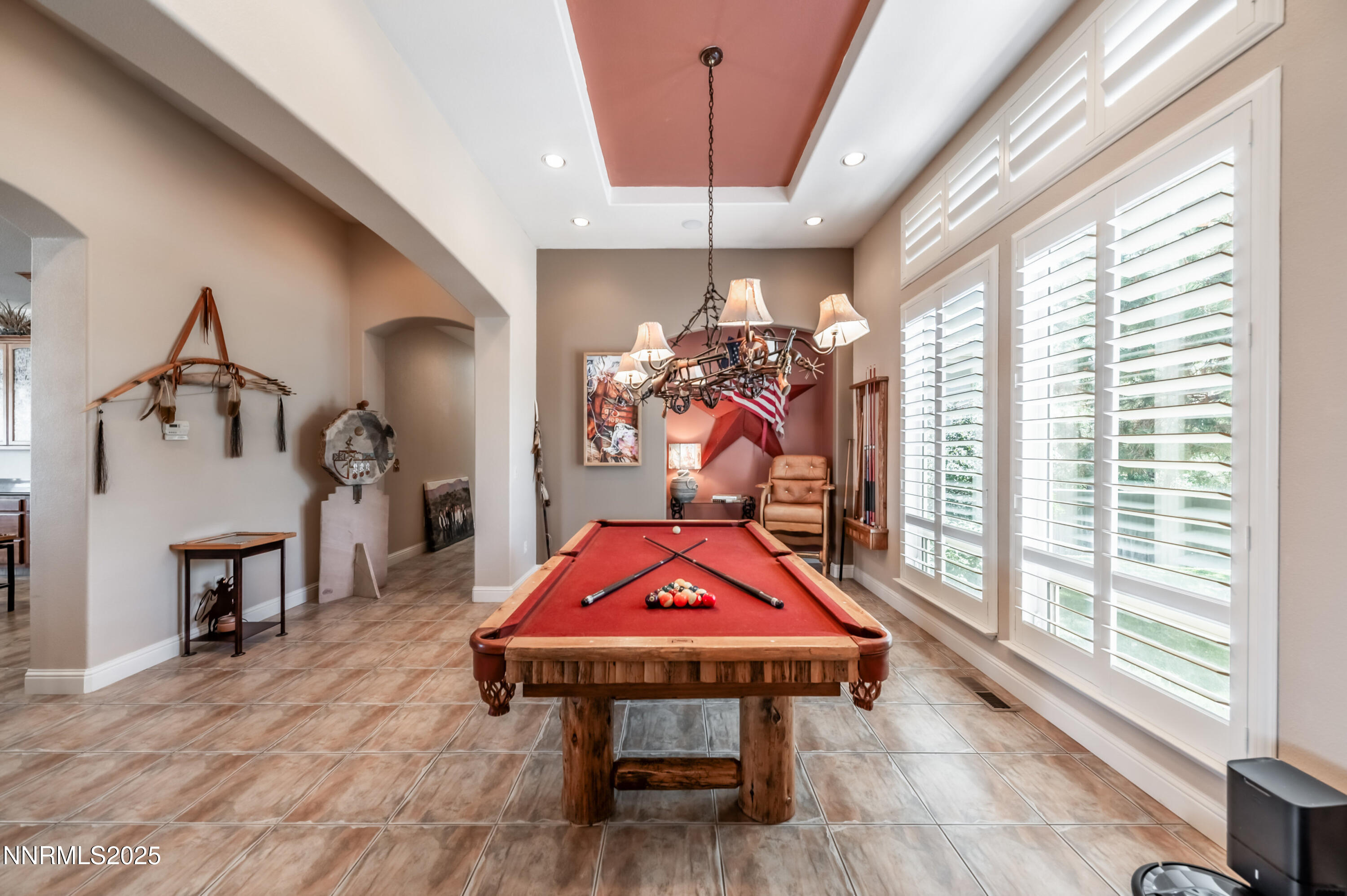 4433 Casey Road Fallon, NV 89406 - Photo 10 of 71 a room with furniture a rug and a chandelier