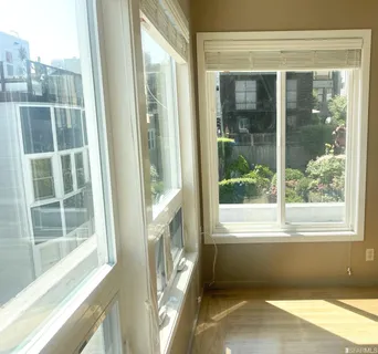 a bunch of flowers in front of a building