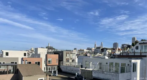 a view of a balcony with an outdoor space