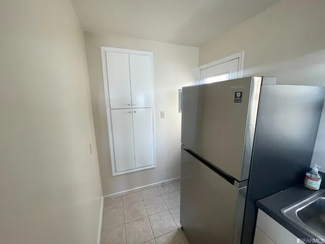 a view of a porch with wooden floor