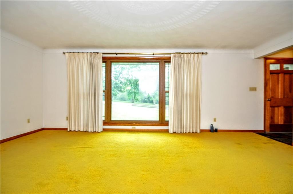 185 Highway 31 Ruffs Dale, PA 15679 - Photo 5 of 25 a view of empty room with window