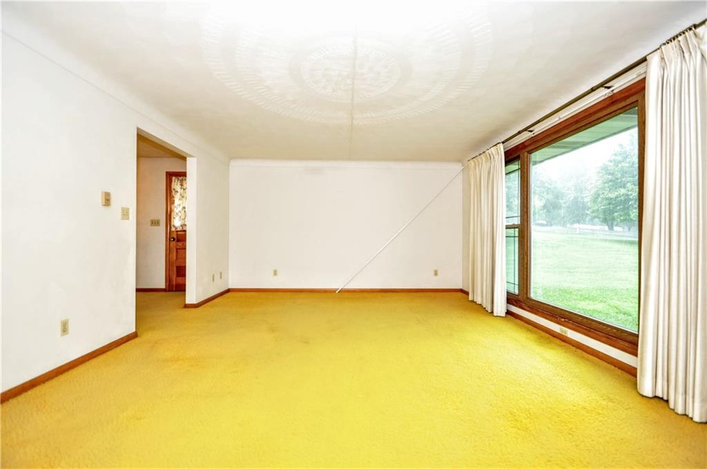 185 Highway 31 Ruffs Dale, PA 15679 - Photo 6 of 25 a view of an empty room with a window
