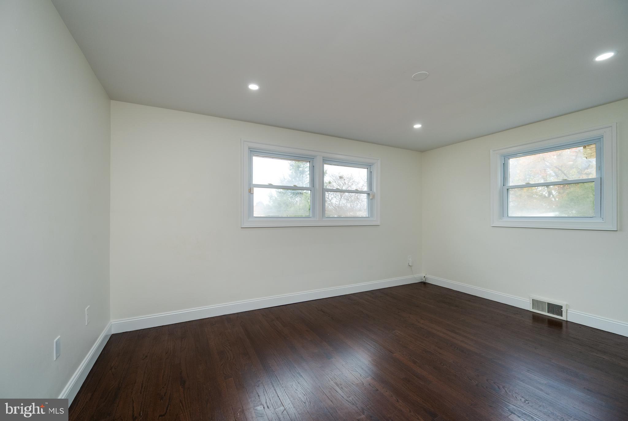 12 Vista Road Reading, PA 19610 - Photo 22 of 39 an empty room with wooden floor and windows
