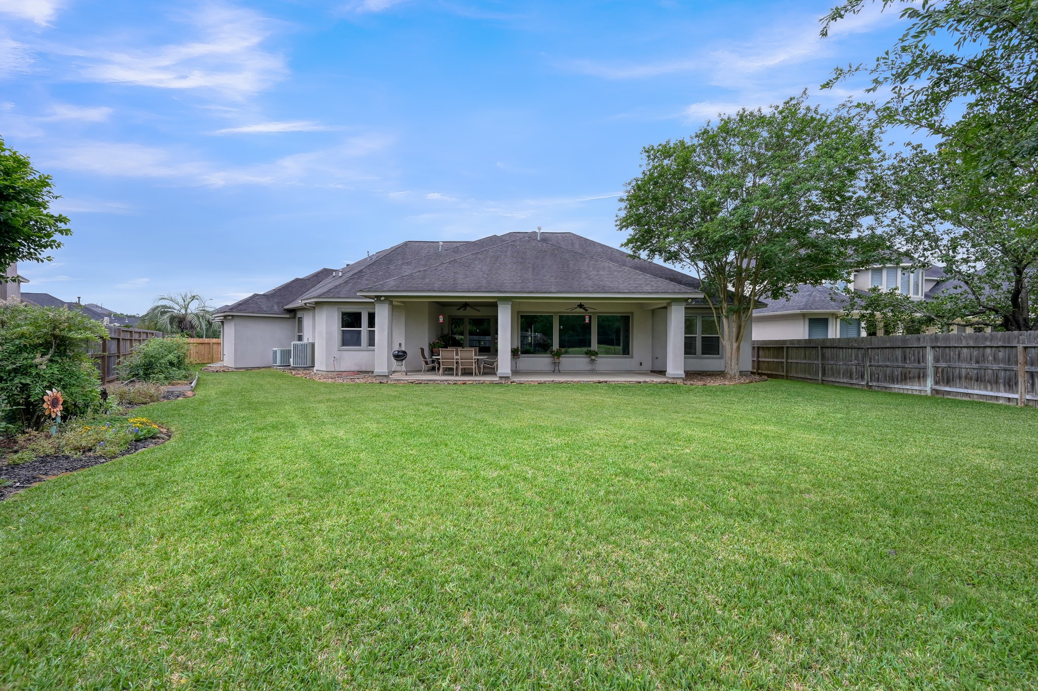 16318 Perry Pass Court Spring, TX 77379 - Photo 35 of 49 Another view of the expansive backyard and patio with plenty of room for a pool!