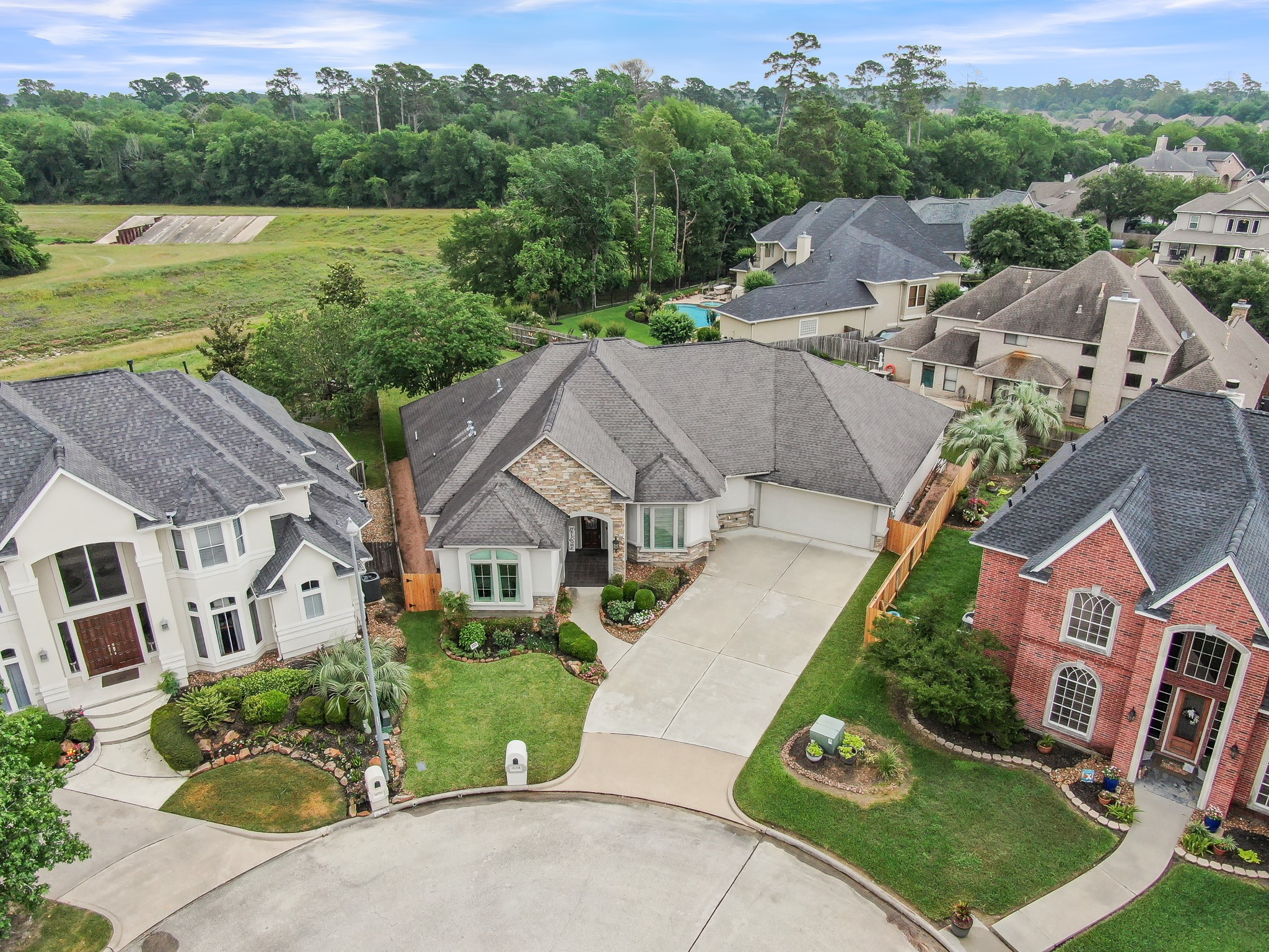 16318 Perry Pass Court Spring, TX 77379 - Photo 40 of 49 An aerial view of the expansive one-story located on a large cul-de-sac lot. Plenty of room to park extra cars.