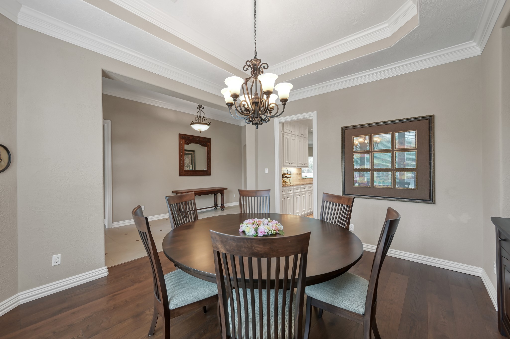 16318 Perry Pass Court Spring, TX 77379 - Photo 5 of 49 The formal dining room has access to the kitchen, and this space flows seamlessly, making entertaining a breeze.
