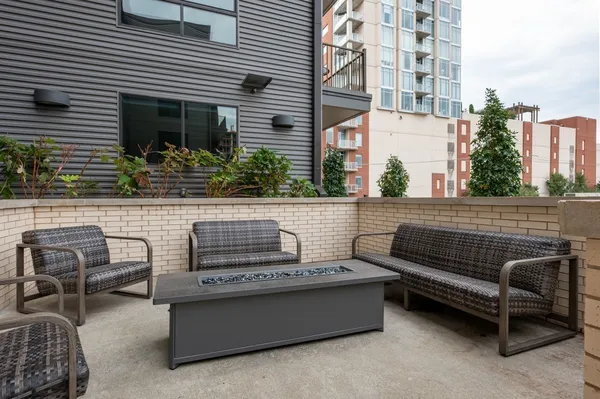 a view of a outdoor seating area with furniture