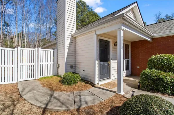a front view of a house with a porch