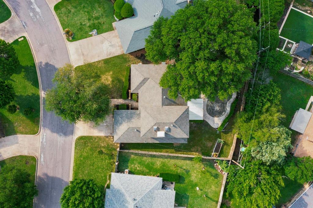 3965 Singleleaf Lane Fort Worth, TX 76133 - Photo 7 of 39 Asphalt shingle roof with multiple gables