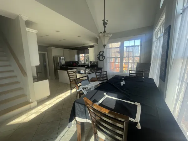 a kitchen with a sink and stainless steel appliances
