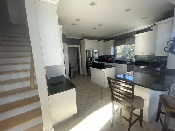 a view of livingroom with furniture and windows