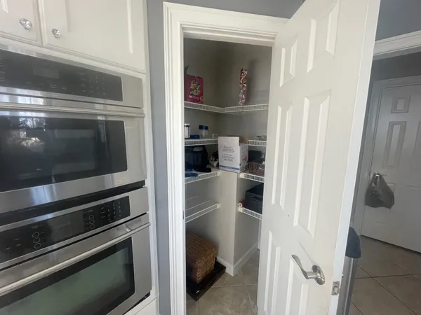 a view of a livingroom from a hallway