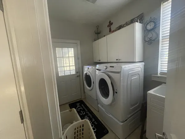 a room with furniture and wooden floor