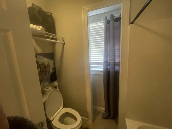 a room with furniture and gym equipment