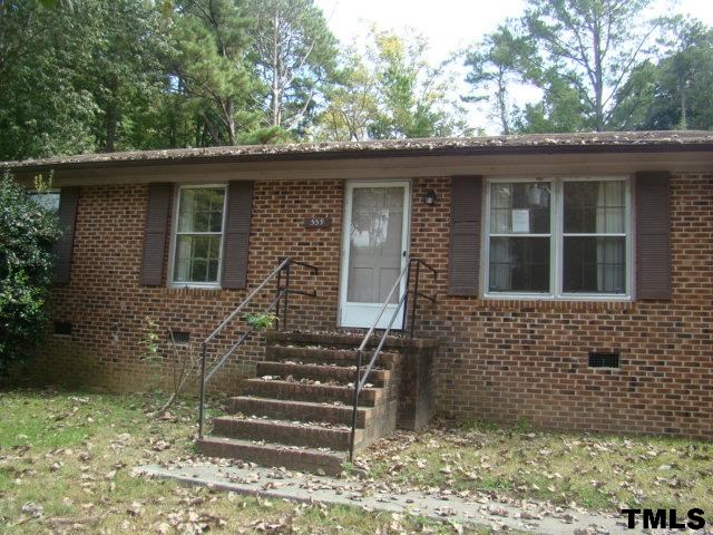 559 Dacian Road Raleigh, NC 27610 - Photo 1 of 12 a front view of a house with a garden