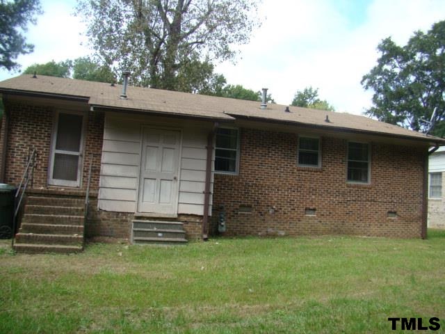 559 Dacian Road Raleigh, NC 27610 - Photo 2 of 12 a backyard of a house with barbeque oven