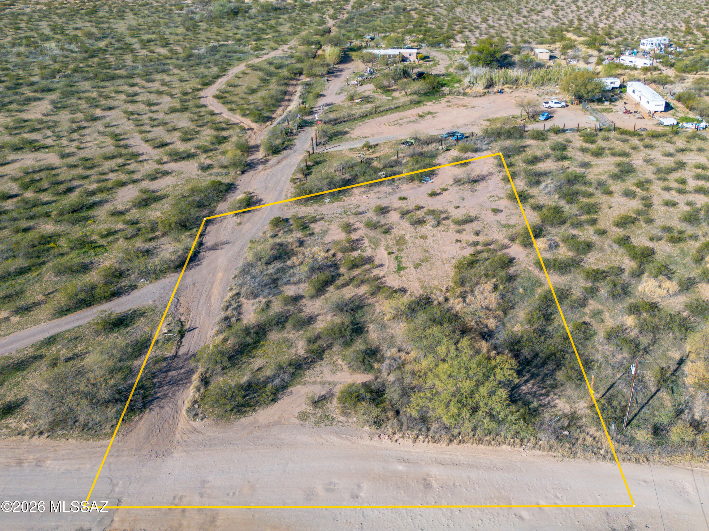 8890 South Fuller Road Tucson, AZ 85735 - Photo 2 of 12 a view of a yard with pathway