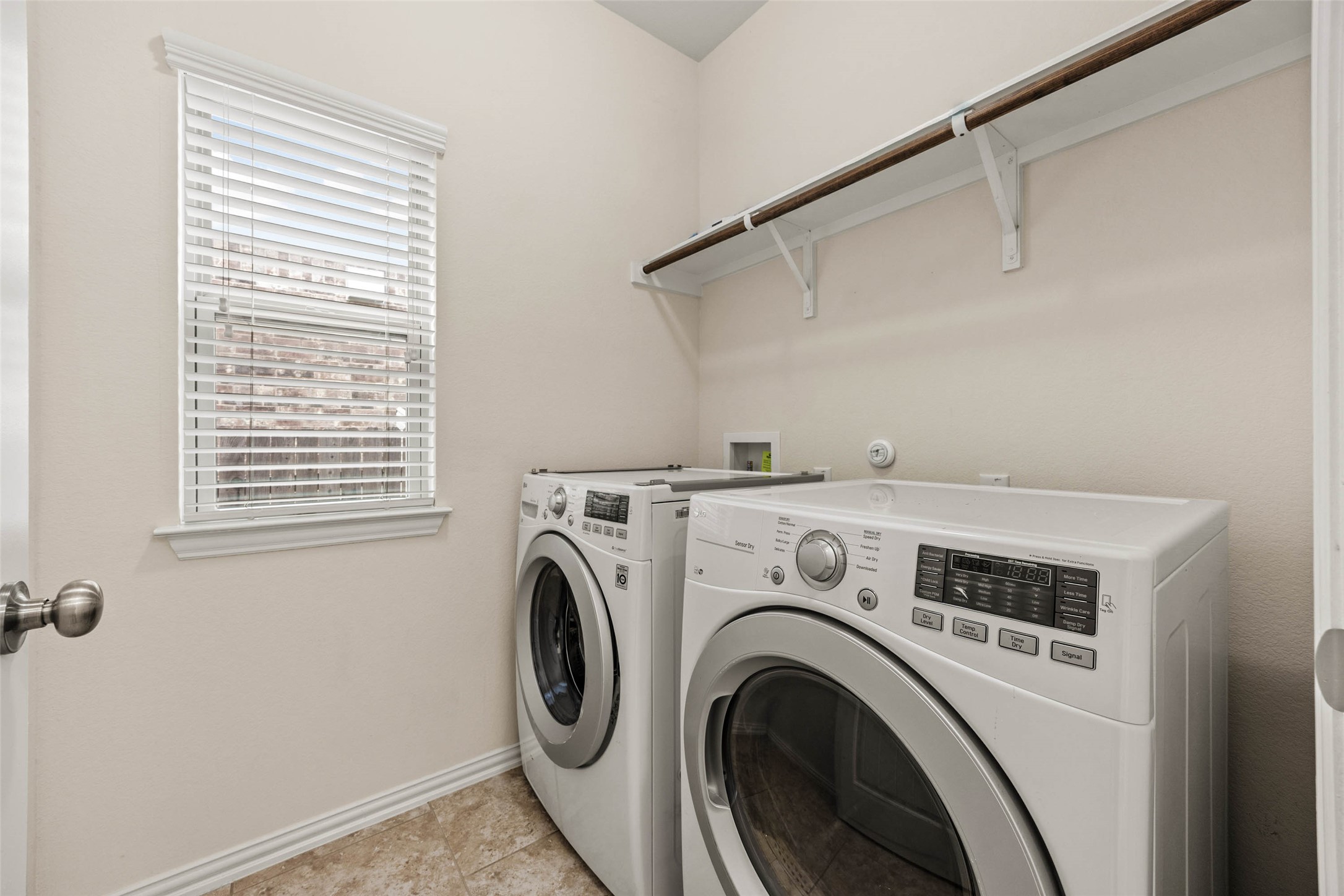 536 Rancho Verde Drive Leander, TX 78641 - Photo 24 of 37 a utility room with dryer and washer