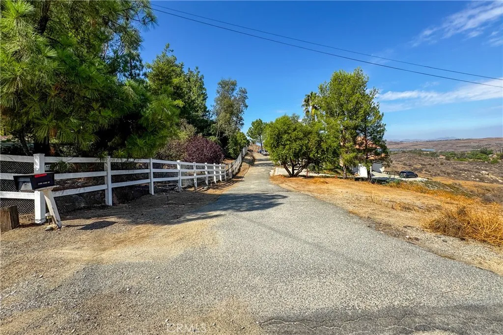 1 Heizer Drive Perris, CA 92570 - Photo 1 of 19 a view of backyard with wooden fence