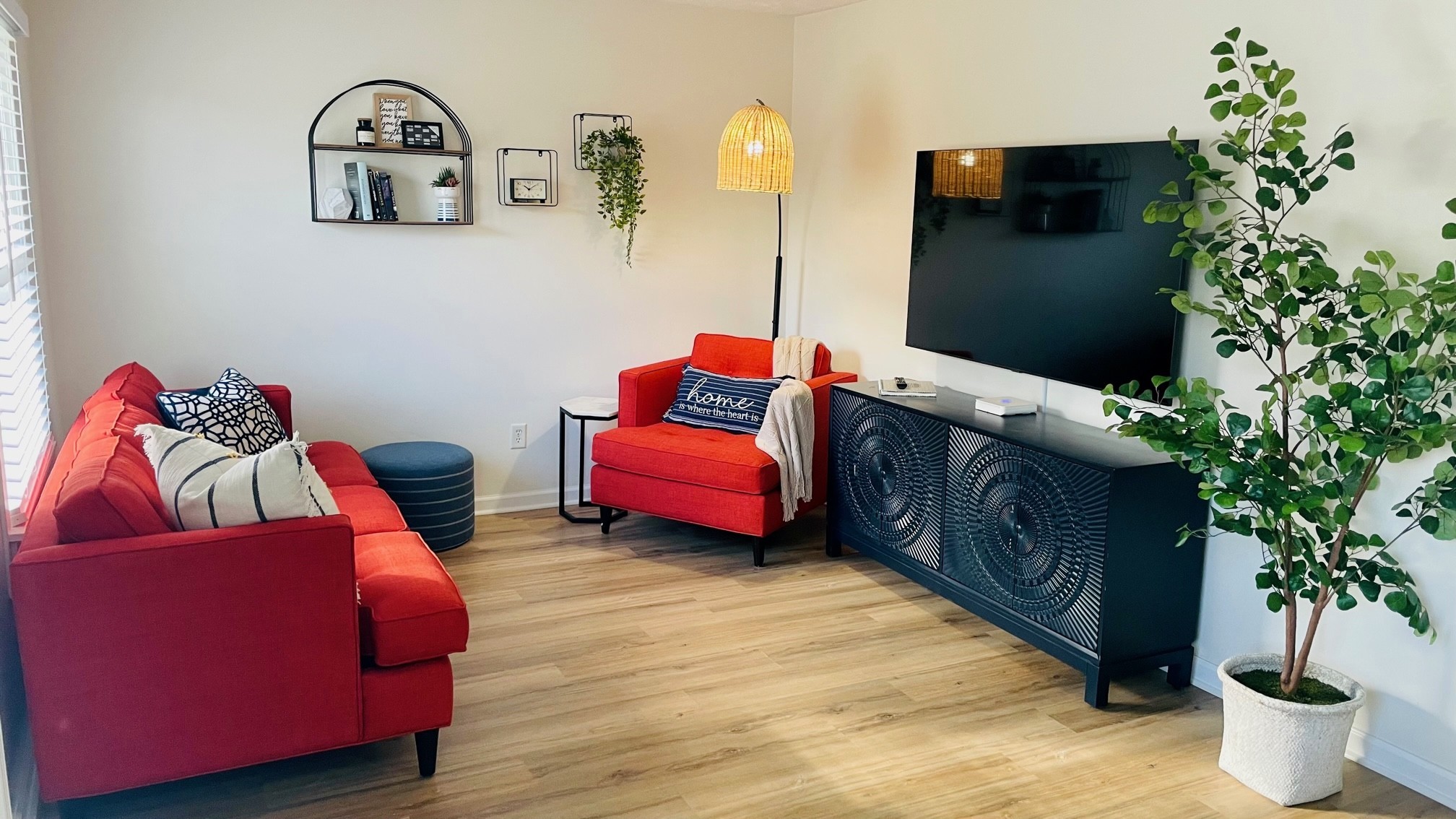 7526 Roundtree Avenue Murfreesboro, TN 37129 - Photo 1 of 67 a living room with furniture and a potted plant