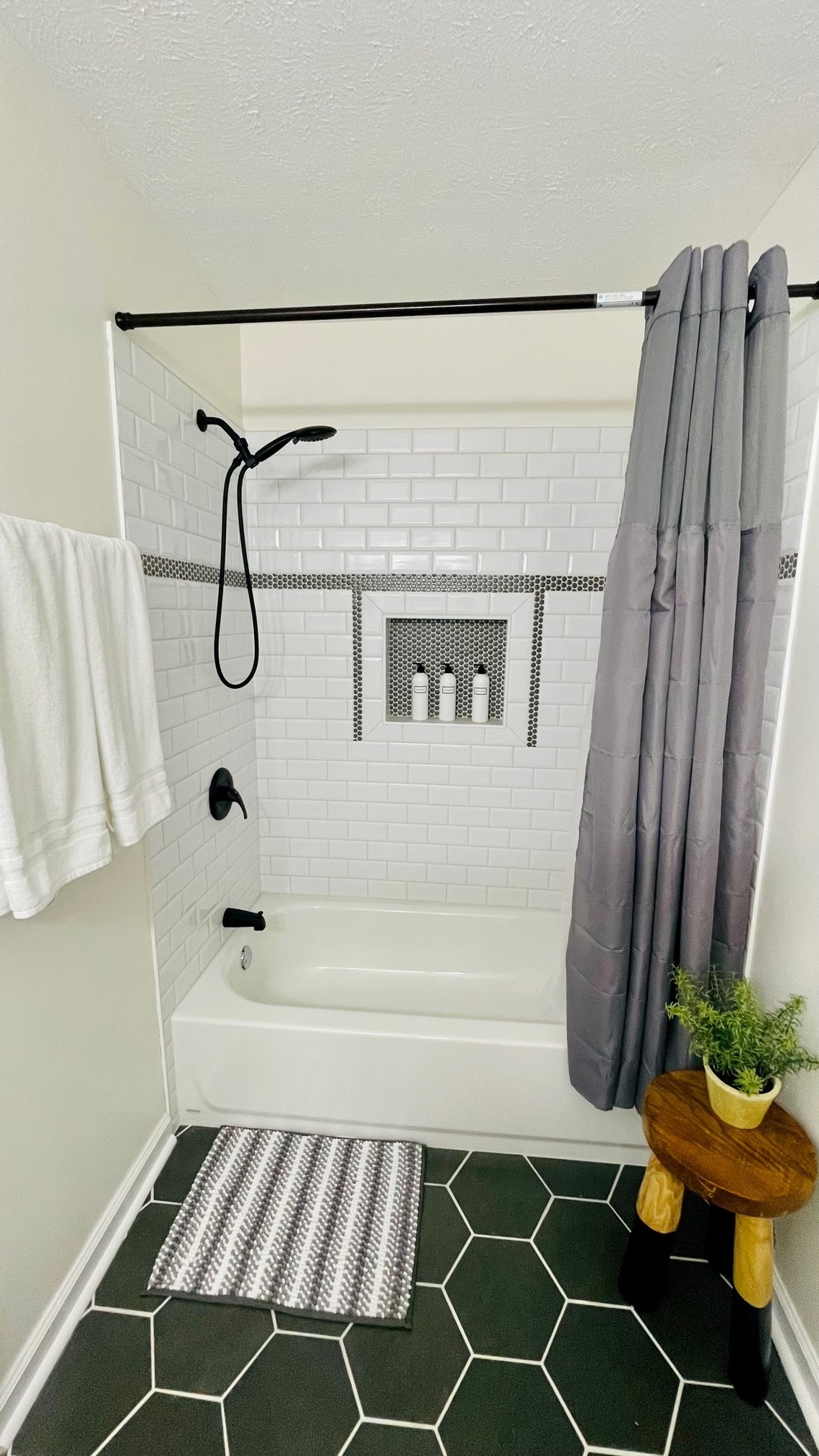 7526 Roundtree Avenue Murfreesboro, TN 37129 - Photo 14 of 67 a bathroom with a shower and a tub