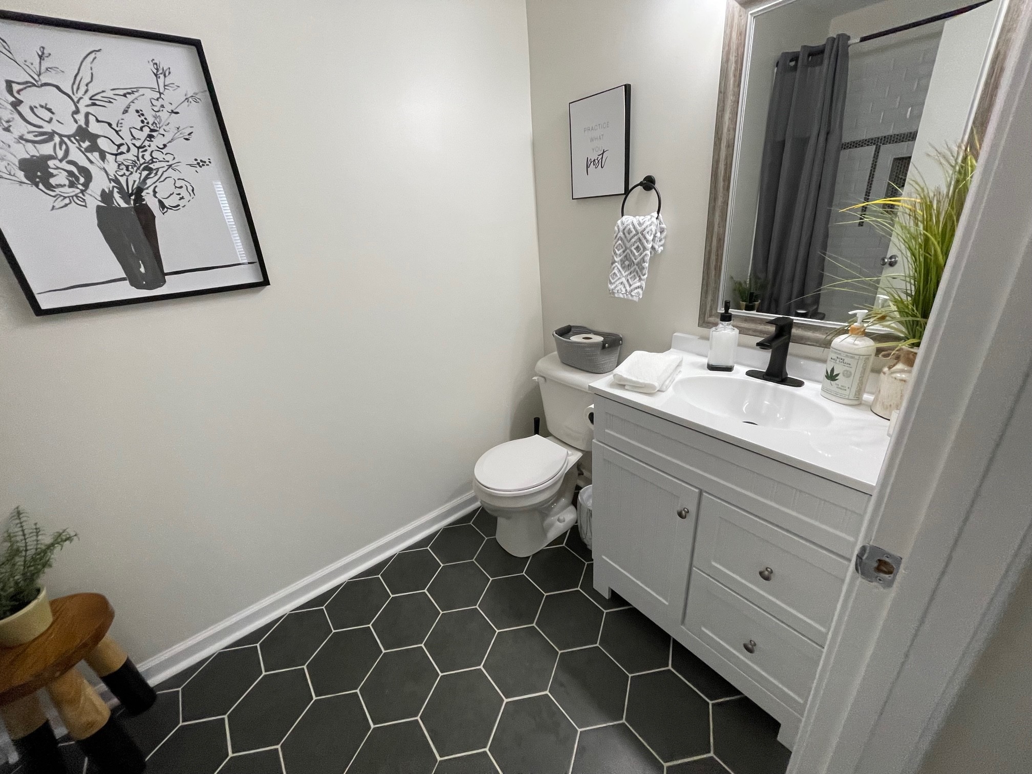 7526 Roundtree Avenue Murfreesboro, TN 37129 - Photo 17 of 67 a bathroom with a double vanity sink mirror and toilet