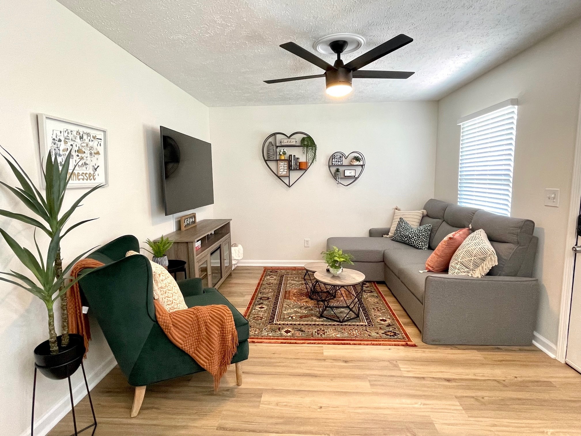 7526 Roundtree Avenue Murfreesboro, TN 37129 - Photo 32 of 67 a living room with furniture and a flat screen tv