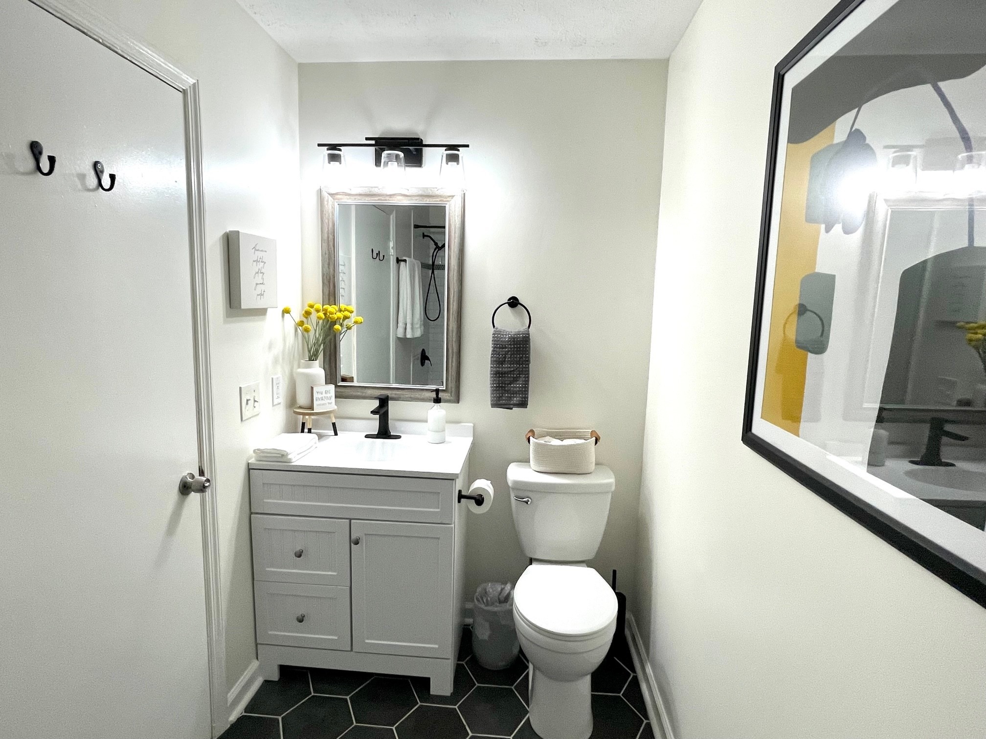 7526 Roundtree Avenue Murfreesboro, TN 37129 - Photo 48 of 67 a bathroom with a toilet sink and mirror