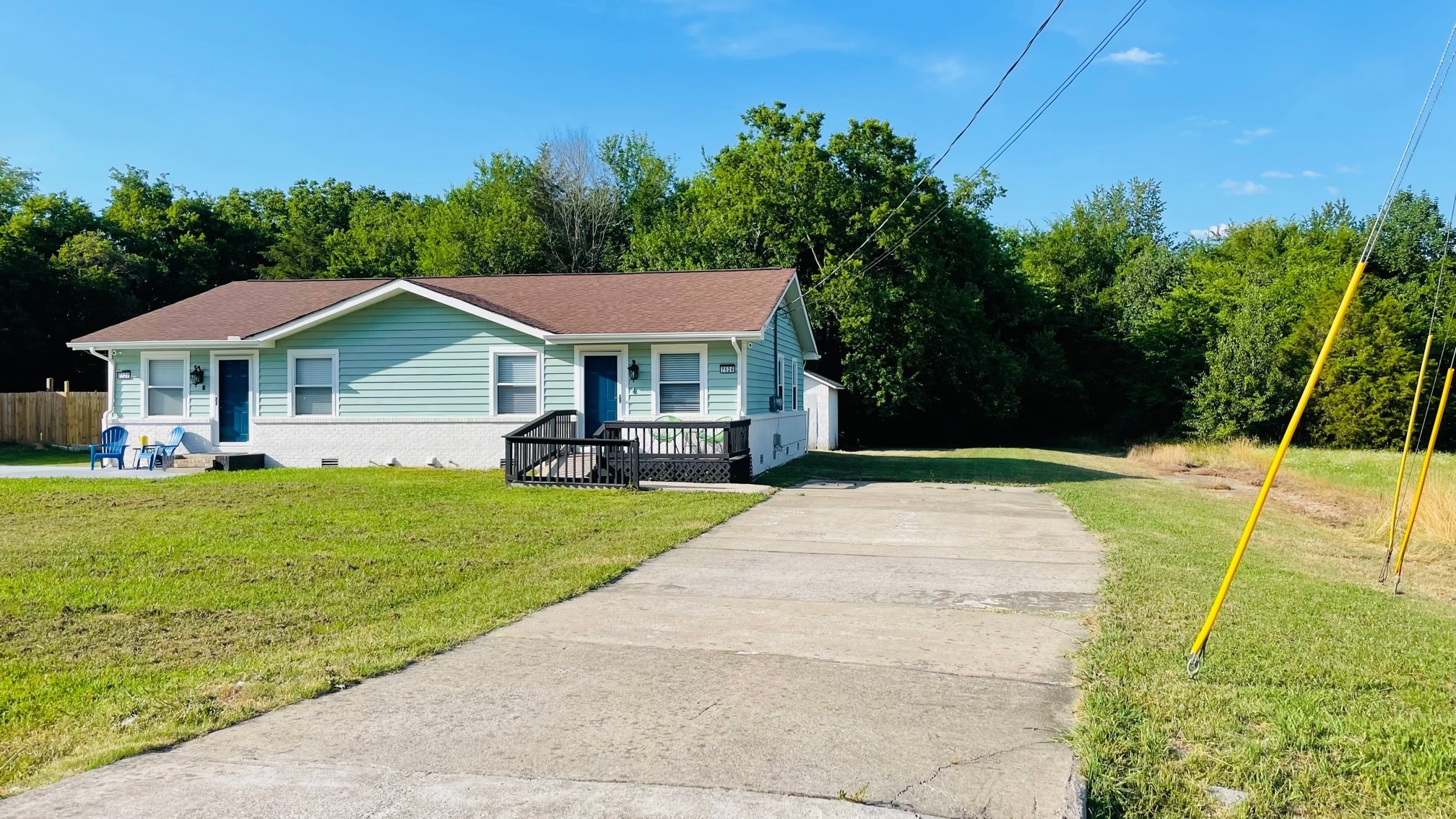 7526 Roundtree Avenue Murfreesboro, TN 37129 - Photo 62 of 67 a front view of a house with a yard