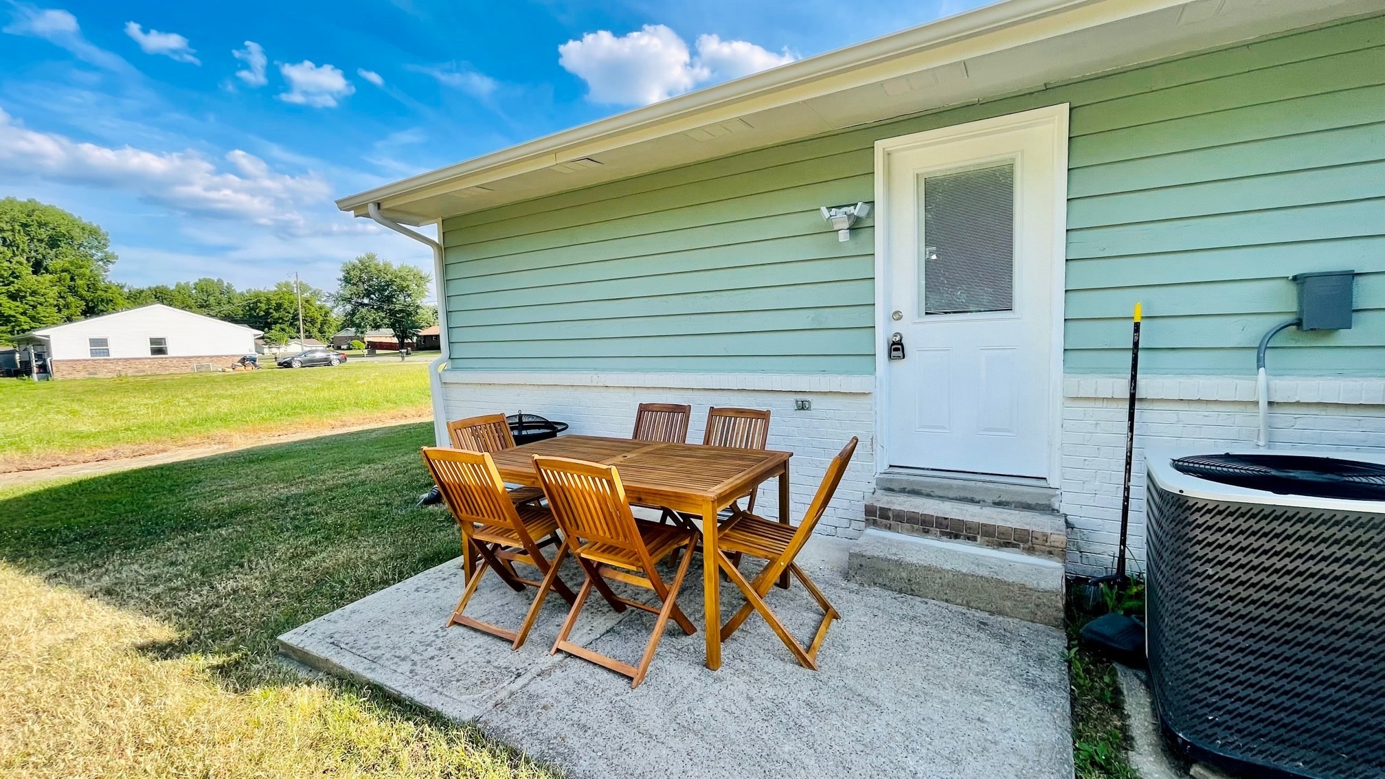7526 Roundtree Avenue Murfreesboro, TN 37129 - Photo 63 of 67 a view of a backyard with table and chairs and a barbeque