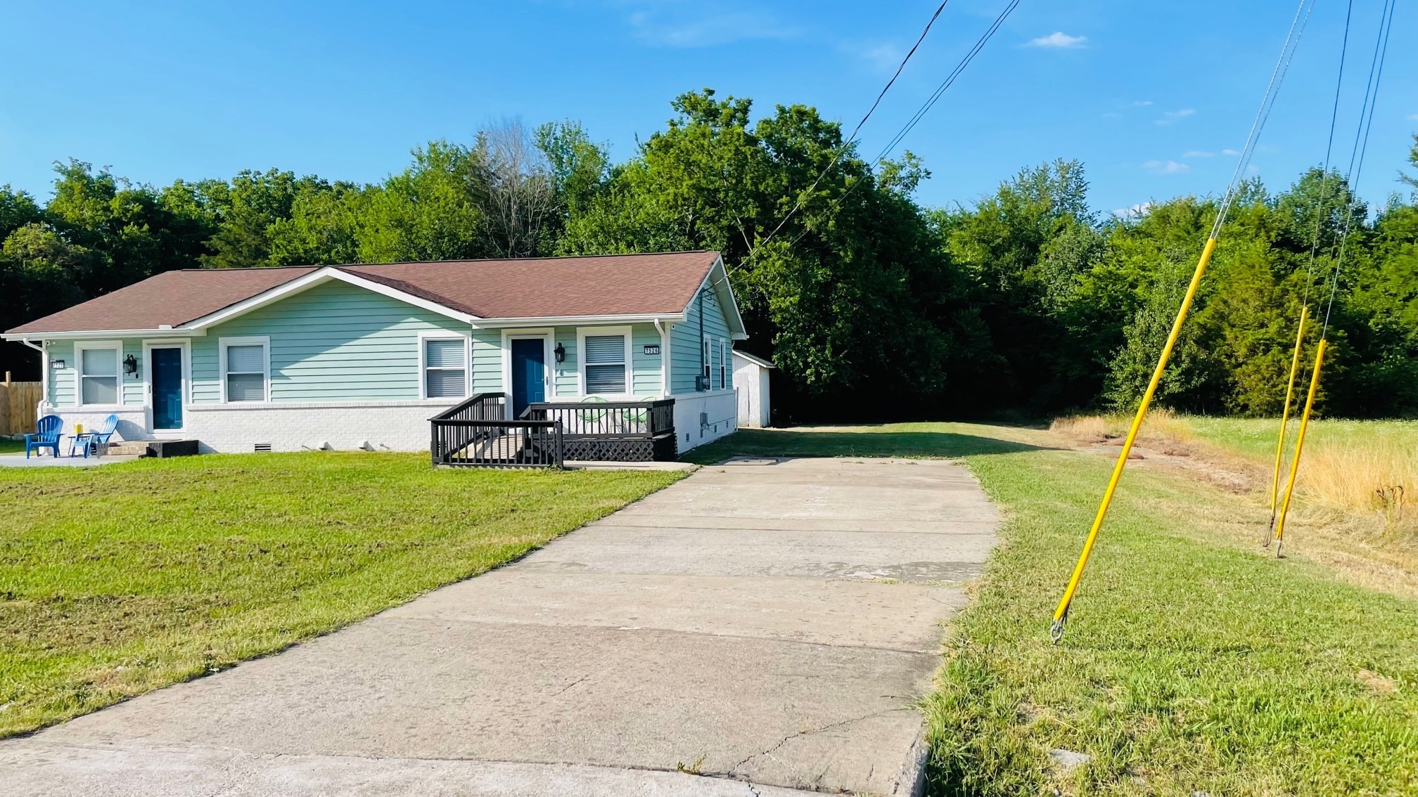 7526 Roundtree Avenue Murfreesboro, TN 37129 - Photo 64 of 67 a front view of a house with a yard