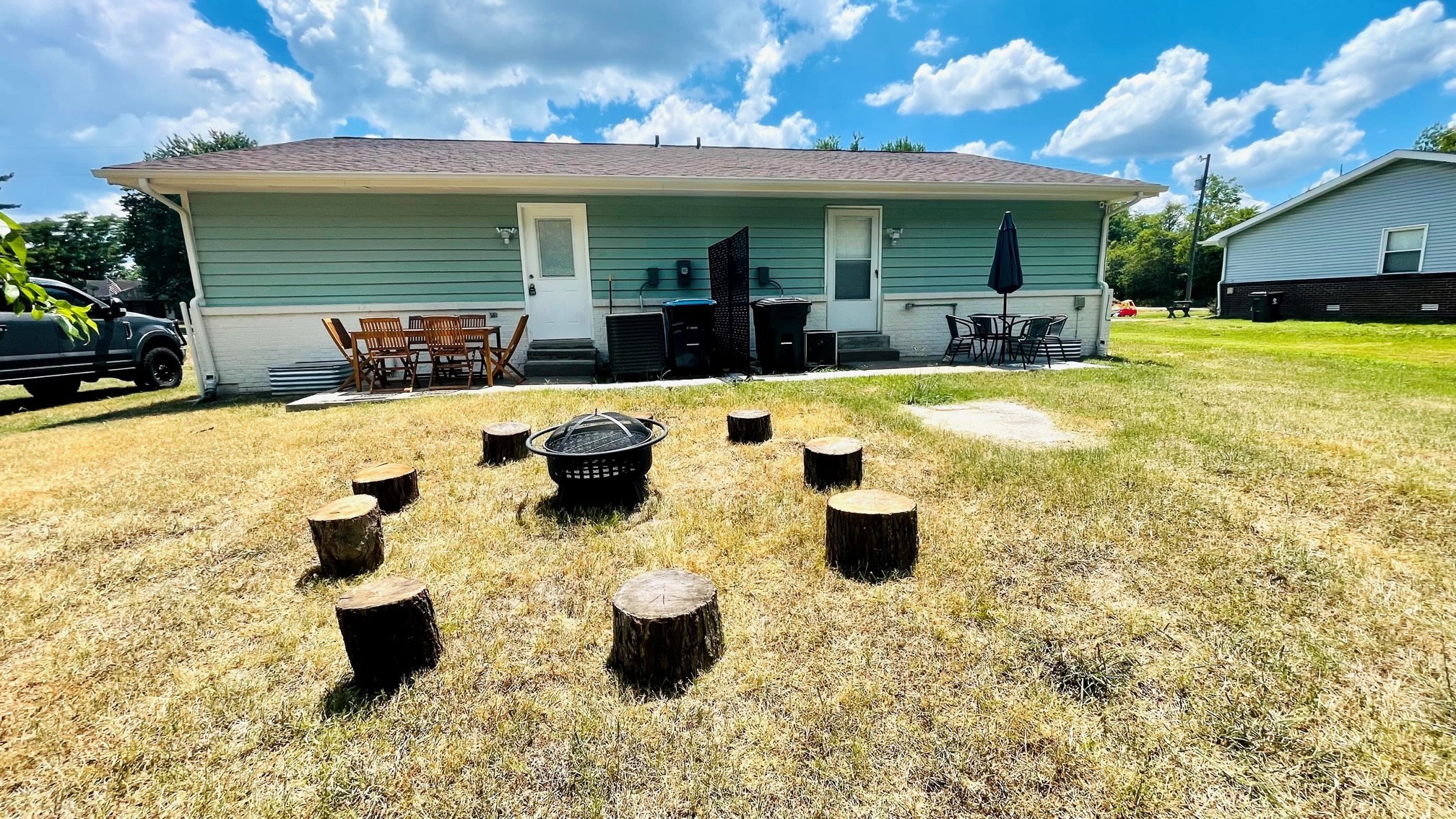 7526 Roundtree Avenue Murfreesboro, TN 37129 - Photo 67 of 67 a view of a patio with dining table and chairs