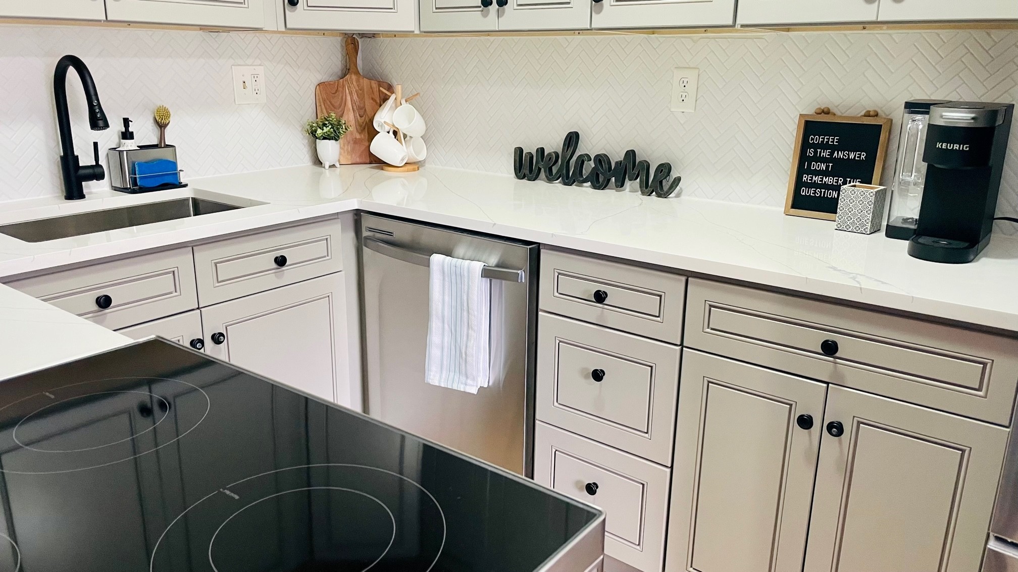 7526 Roundtree Avenue Murfreesboro, TN 37129 - Photo 7 of 67 a kitchen with white cabinets and sink