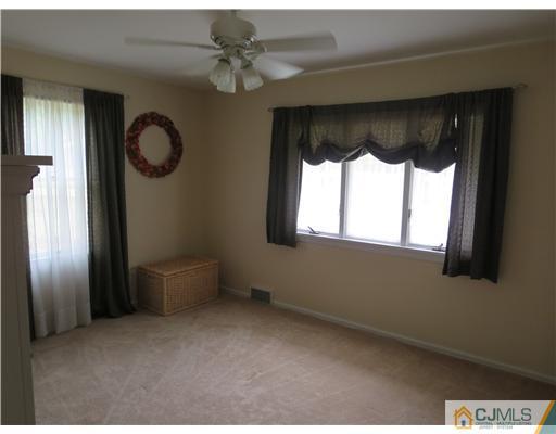 5 Maida Road Edison, NJ 08820 - Photo 13 of 23 a view of an empty room with a window