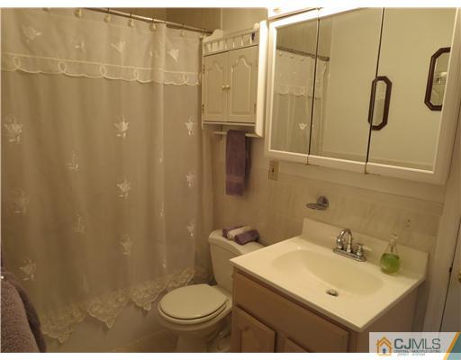 5 Maida Road Edison, NJ 08820 - Photo 15 of 23 a bathroom with a sink toilet and shower