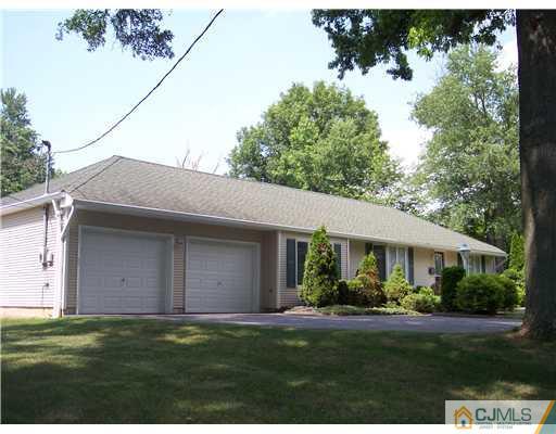 5 Maida Road Edison, NJ 08820 - Photo 23 of 23 a front view of a house with a garden